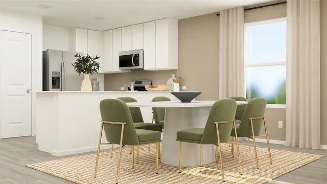 a dining room with furniture and wooden floor