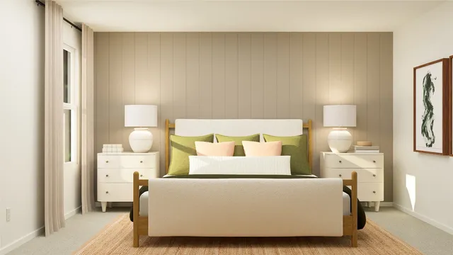 a bed room with a bed and a lamp