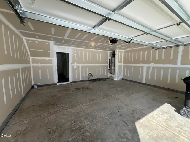 a house with swimming pool in front of it