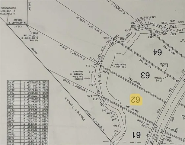 a view of a hall with wooden floor