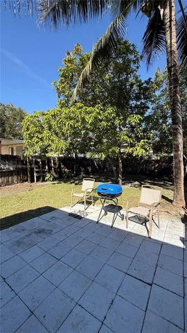 a view of swimming pool with lounge chair