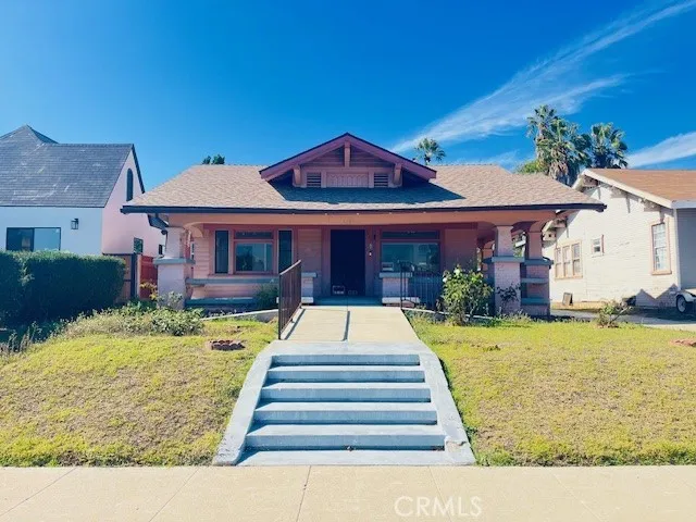 a front view of a house with swimming pool