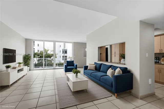 a bathroom with a shower sink vanity and mirror
