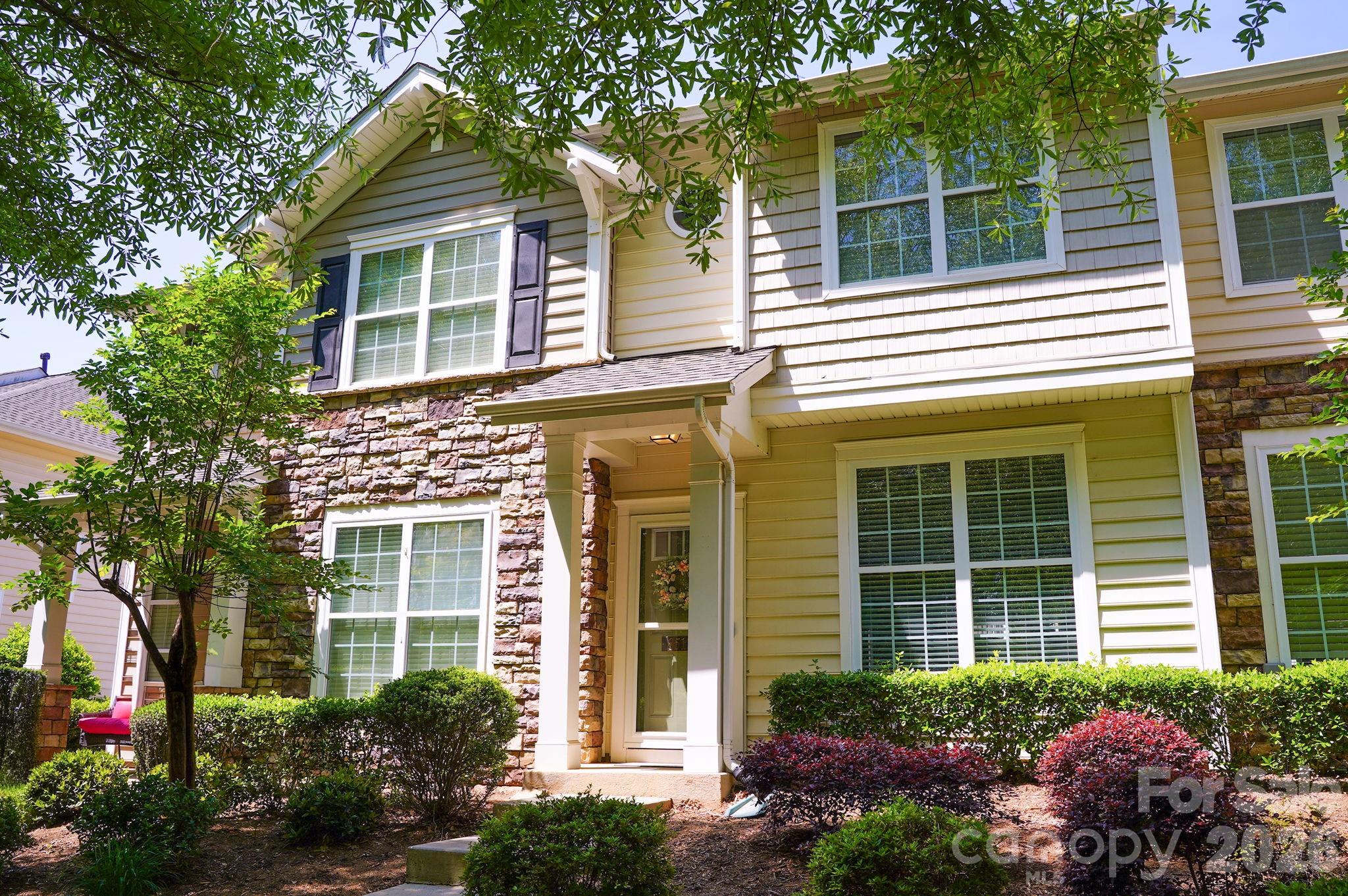 a house view with a garden space