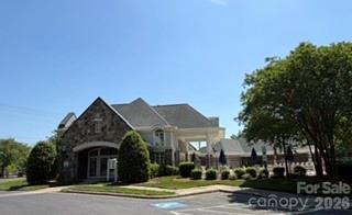 8512 Sunset Hill Road Waxhaw, NC 28173 - Photo 34 of 36 a front view of a house with a yard