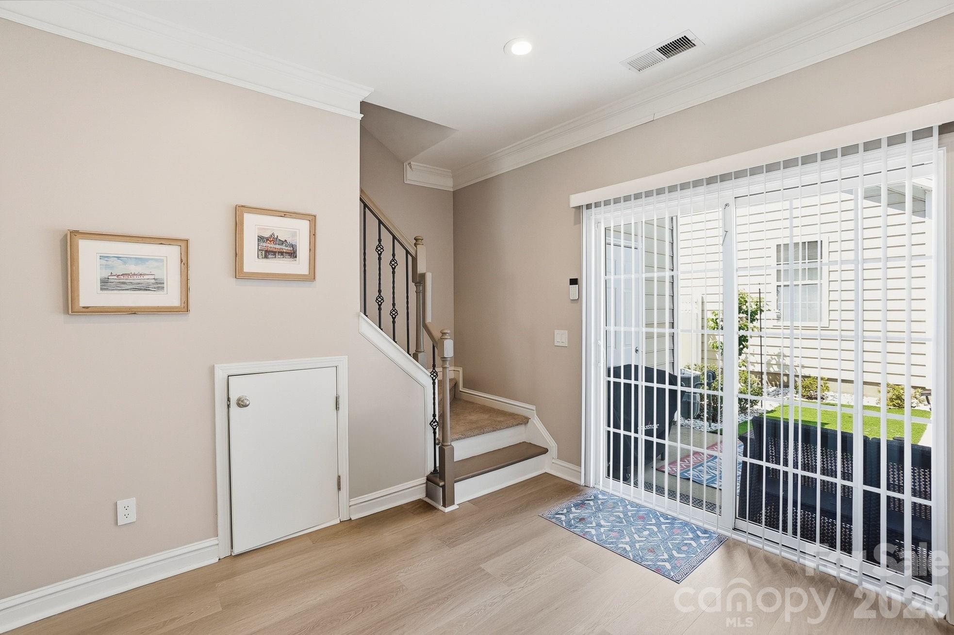 8512 Sunset Hill Road Waxhaw, NC 28173 - Photo 6 of 36 a view of a hallway with workspace
