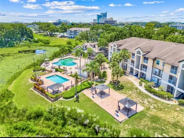 an aerial view of a house with a garden