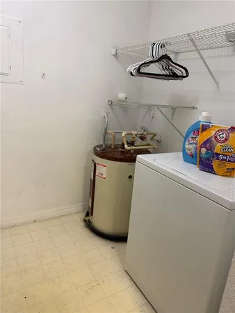 a storage room with washer and dryer
