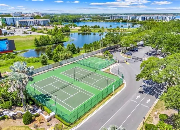 a view of a playground with a house