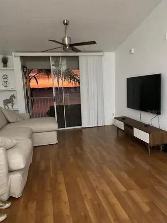 a view of livingroom with furniture and chandelier
