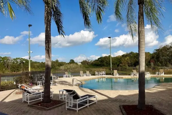 a kitchen with a sink and a stove top oven