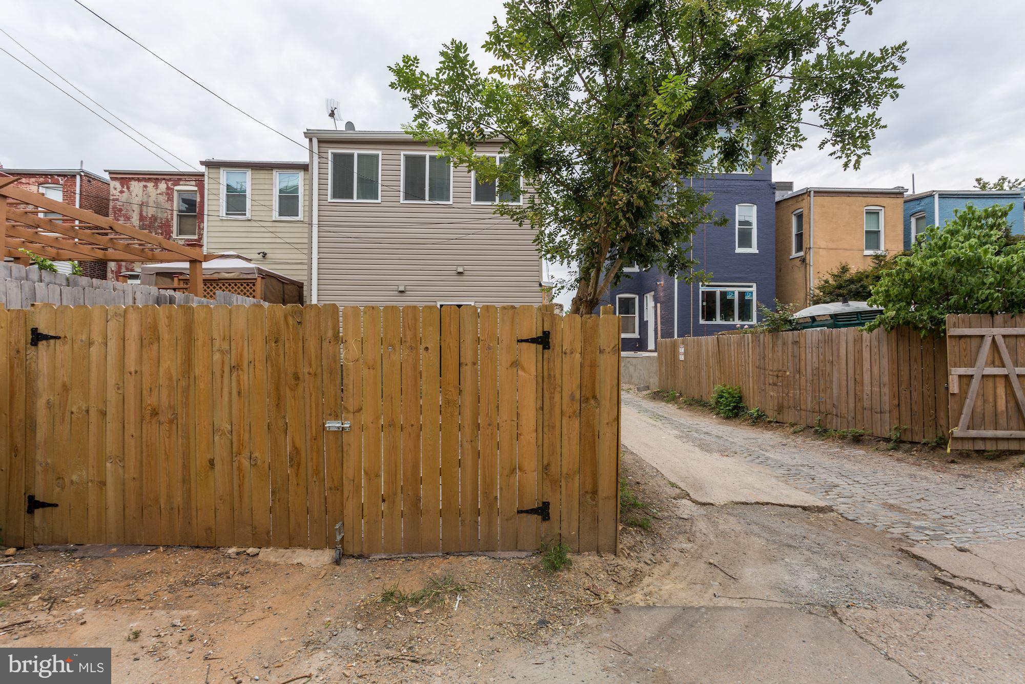 638 G Street Northeast Washington, DC 20002 - Photo 13 of 25 a view of a house with wooden fence