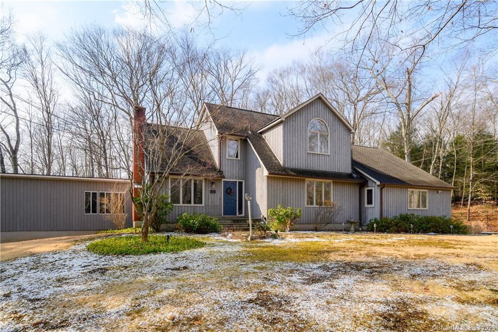 169 Hanover Road Newtown, CT 06470 - Photo 1 of 1 a front view of a house with garden