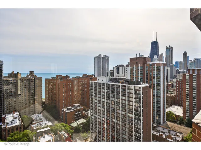 a view of a city with tall buildings