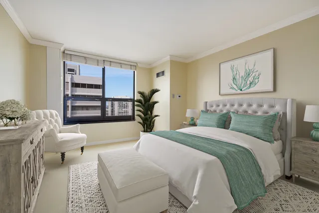 a bedroom with a bed and a couch