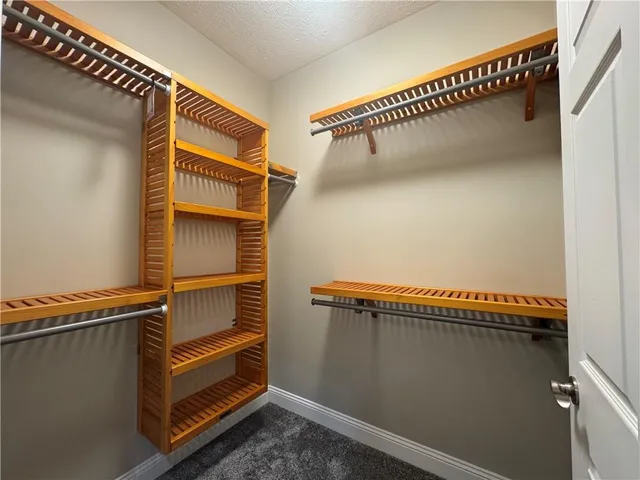 a view of a room with rack on the wall