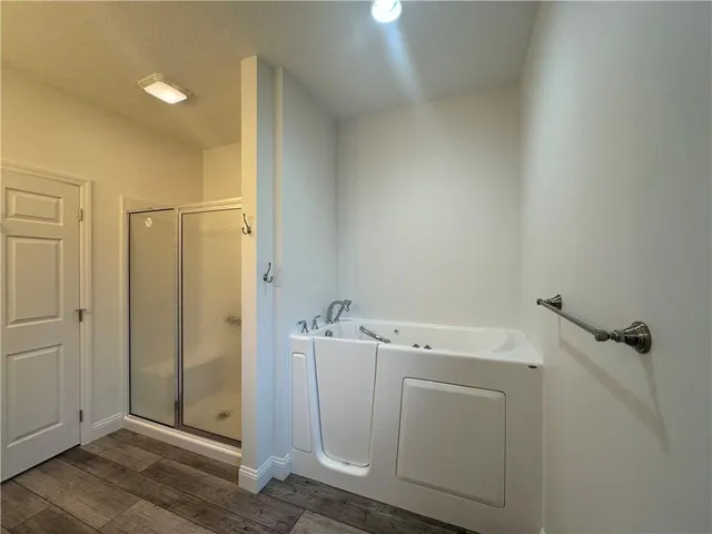 a view of a bathroom with utility room