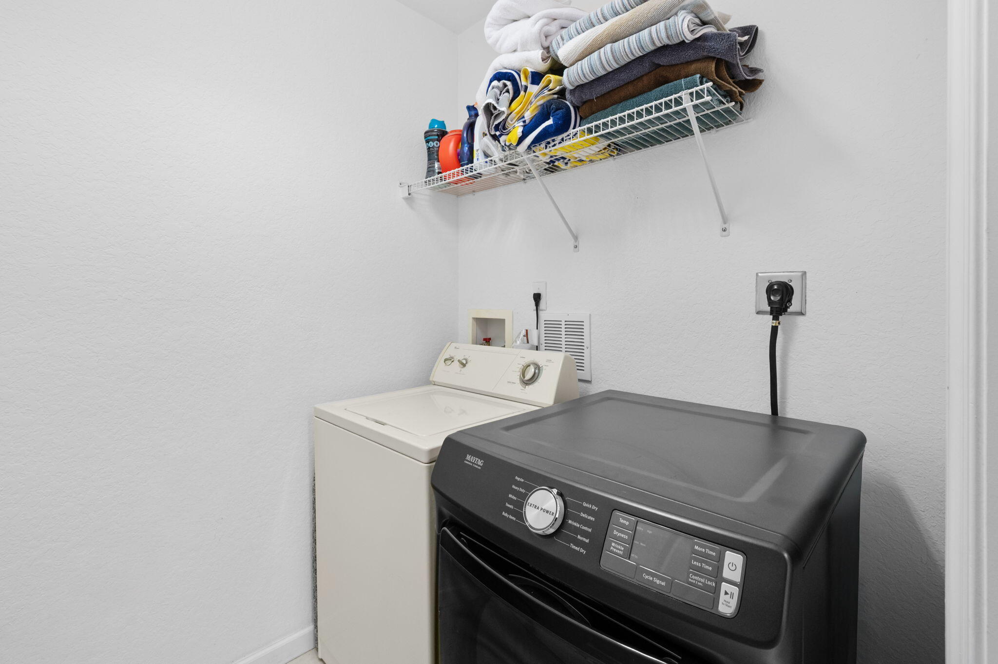 10520 Southwest Stephanie Way, Unit 2203 Port St. Lucie, FL 34987 - Photo 16 of 20 Laundry and Hidden Pantry