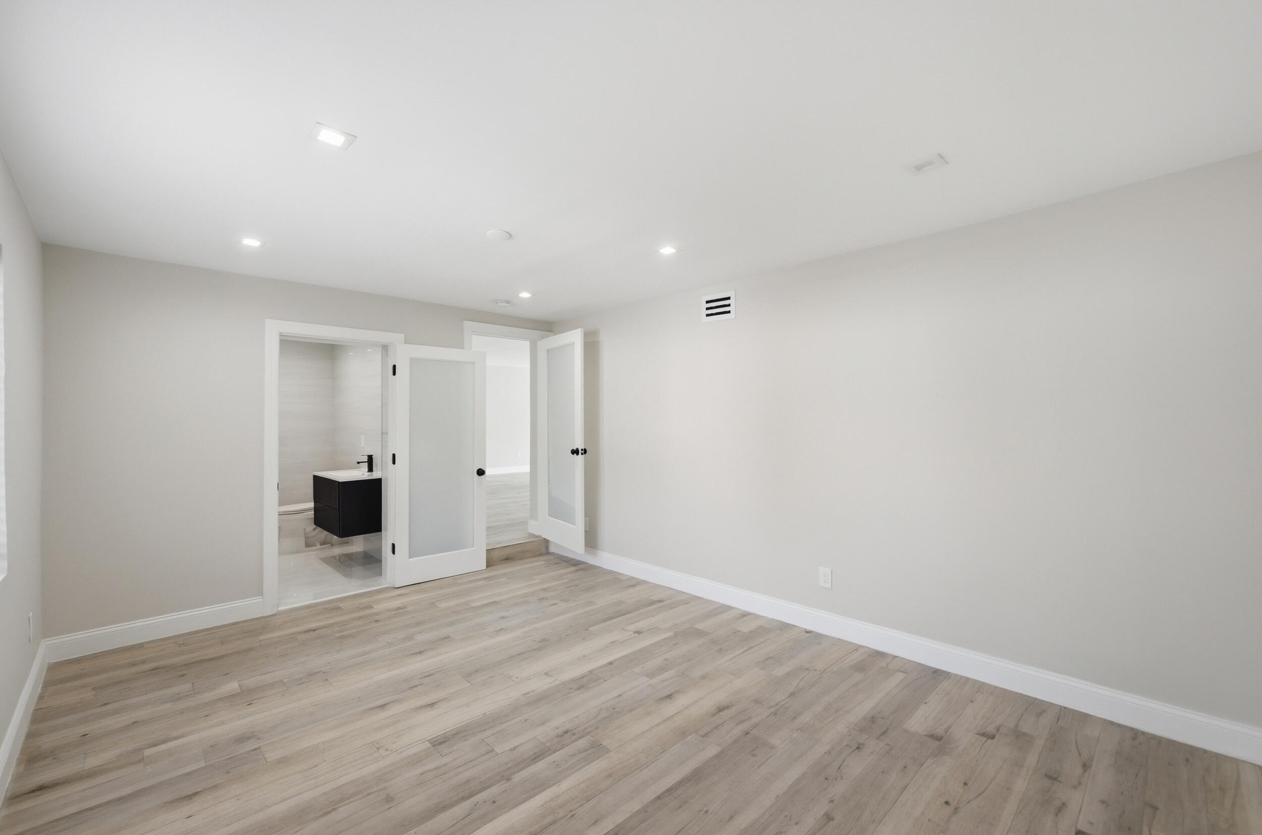 1770 Southwest 17th Avenue Miami, FL 33145 - Photo 21 of 46 a view of an empty room with wooden floor and closet
