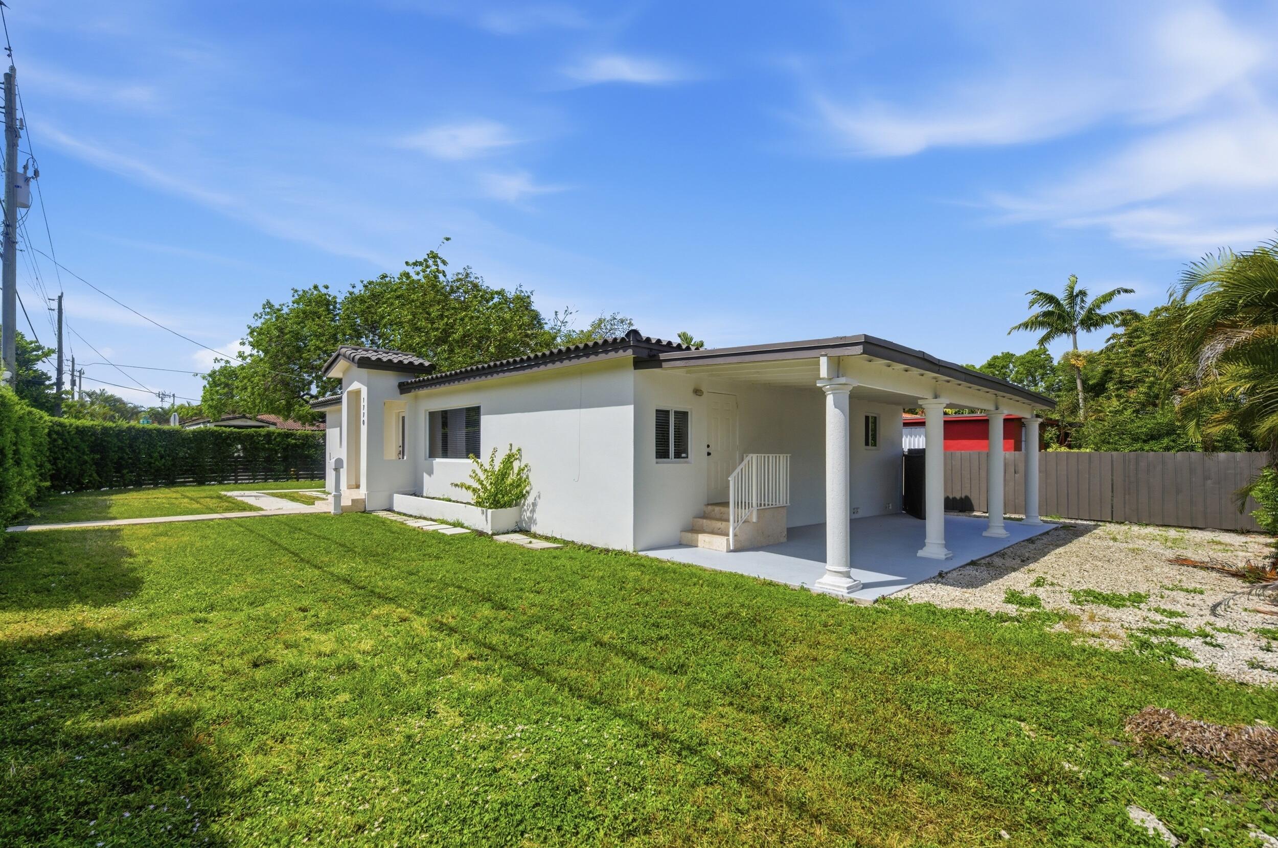 1770 Southwest 17th Avenue Miami, FL 33145 - Photo 5 of 46 a view of a house with a yard and sitting area