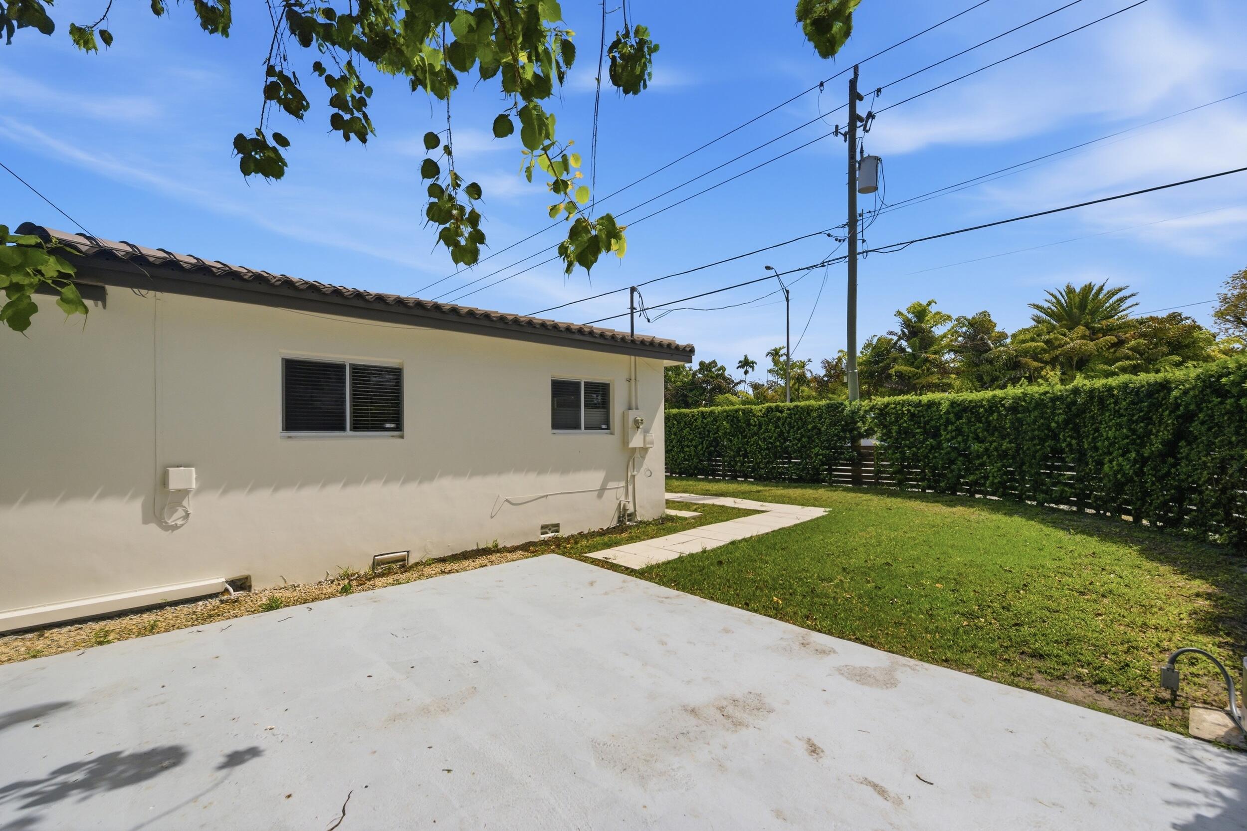 1770 Southwest 17th Avenue Miami, FL 33145 - Photo 6 of 46 a view of a backyard space with potted plants