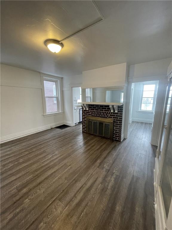 136 South Spring Avenue Greensburg, PA 15601 - Photo 13 of 46 an empty room with wooden floor and fire place