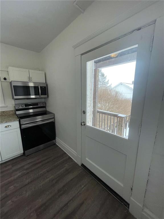 136 South Spring Avenue Greensburg, PA 15601 - Photo 16 of 46 a kitchen with wooden floors and appliances