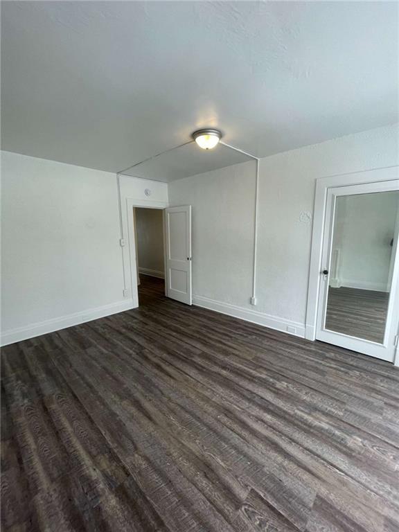 136 South Spring Avenue Greensburg, PA 15601 - Photo 26 of 46 a view of an empty room with wooden floor
