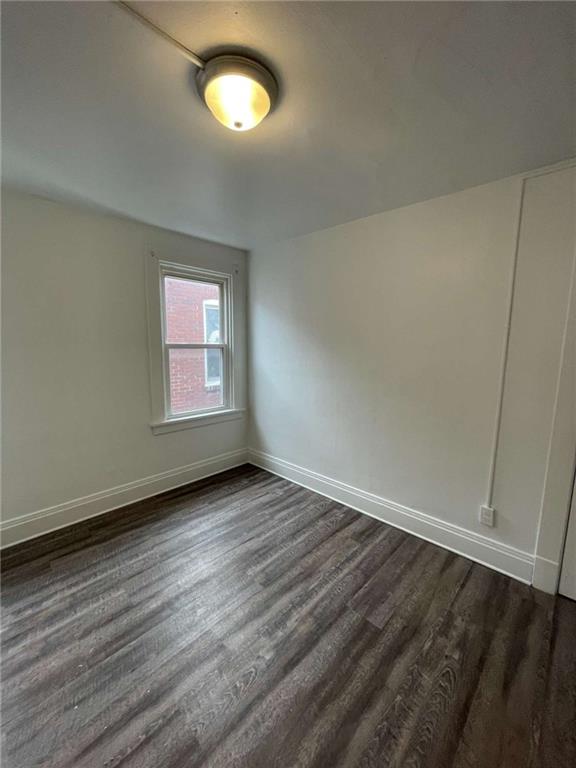 136 South Spring Avenue Greensburg, PA 15601 - Photo 27 of 46 an empty room with wooden floor and windows