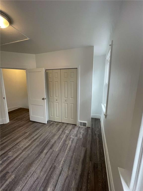 136 South Spring Avenue Greensburg, PA 15601 - Photo 28 of 46 an empty room with wooden floor and closet