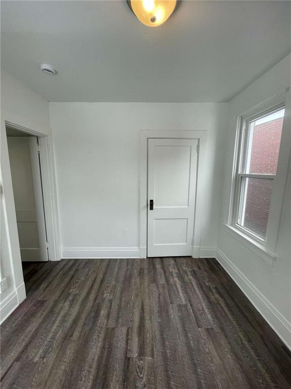 136 South Spring Avenue Greensburg, PA 15601 - Photo 36 of 46 an empty room with wooden floor and windows