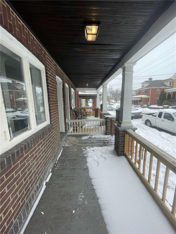 136 South Spring Avenue Greensburg, PA 15601 - Photo 4 of 46 a view of a porch with furniture