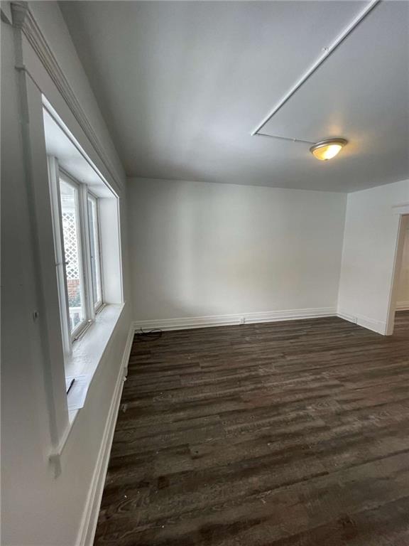 136 South Spring Avenue Greensburg, PA 15601 - Photo 6 of 46 a view of an empty room with wooden floor and a window