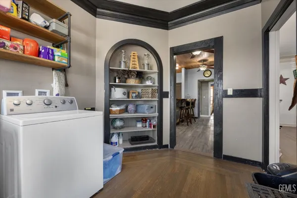 a view of storage and utility room with washer and dryer