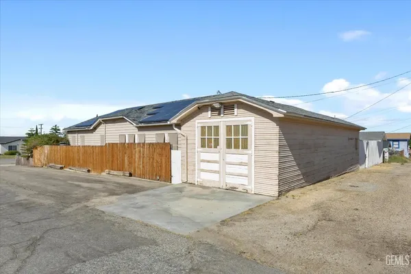 a front view of a house with a garage