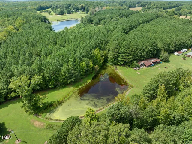 a view of a lake with a yard