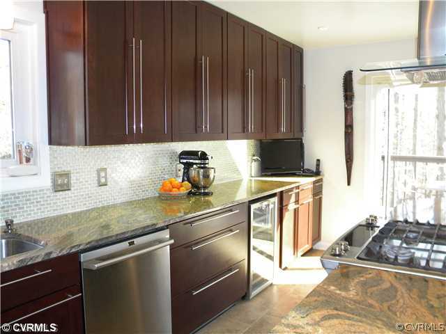 Kitchen - Custom Cabinets, stainless appliances in