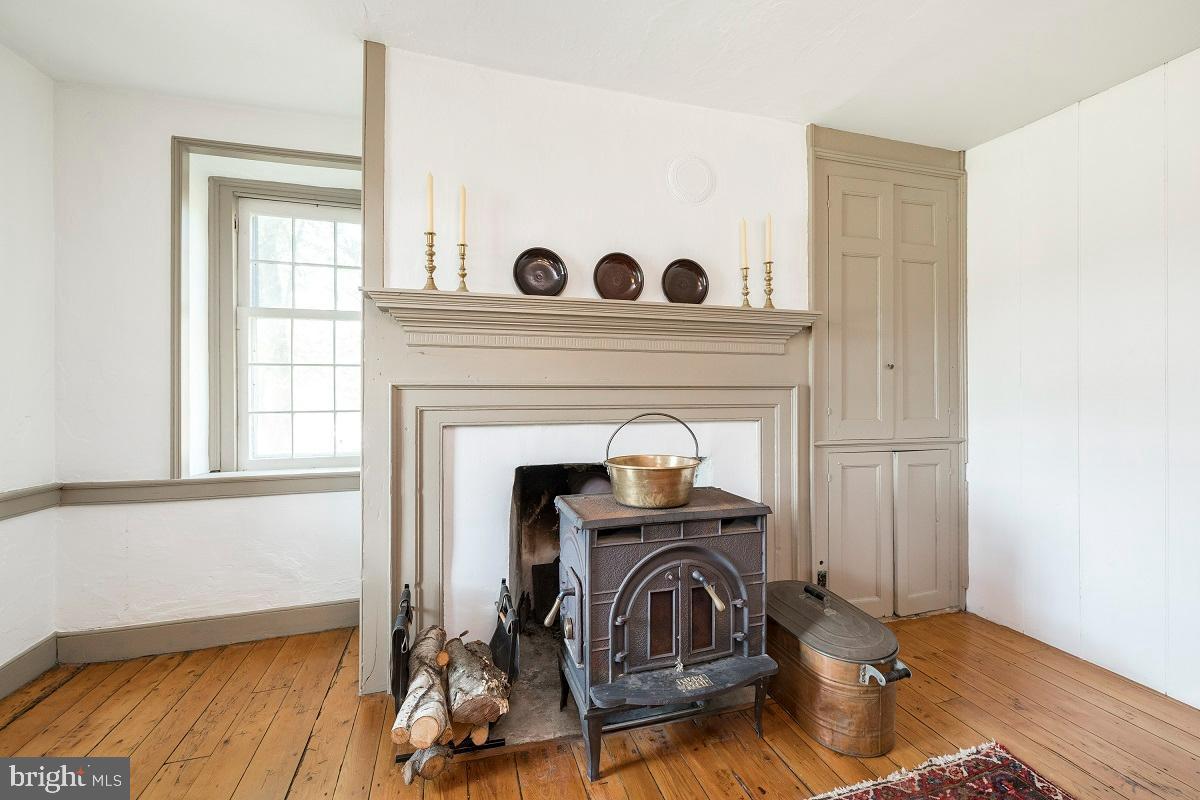 1251 Conestoga Road Chester Springs, PA 19425 - Photo 8 of 63 Woodstove in Living room