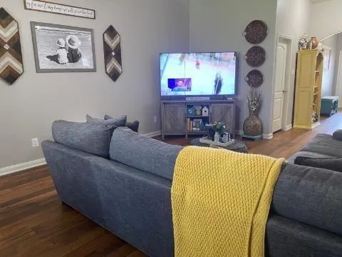 a living room with furniture and a window