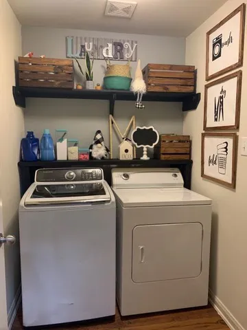 a utility room with dryer and washer