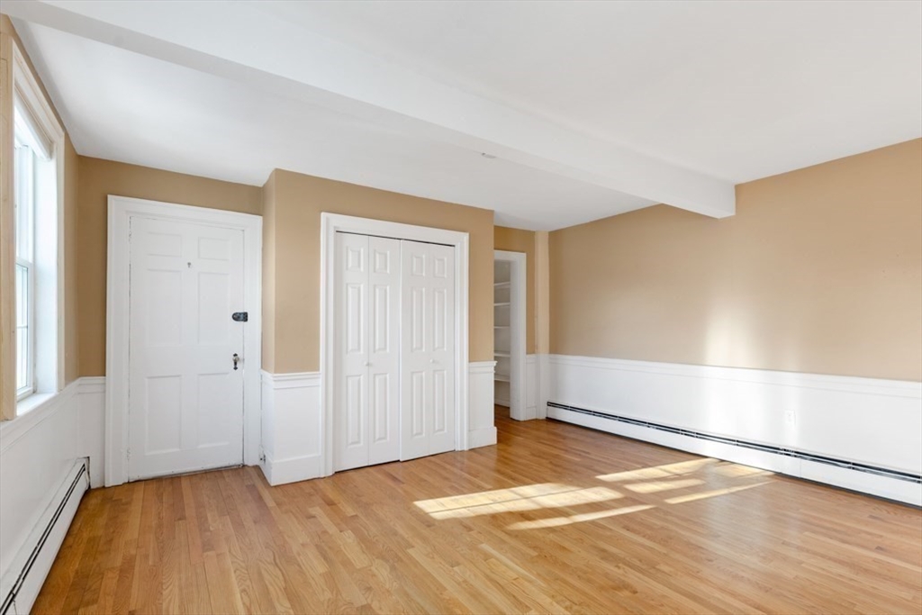 14 Mall Street, Unit B Salem, MA 01970 - Photo 21 of 30 a view of an empty room with wooden floor