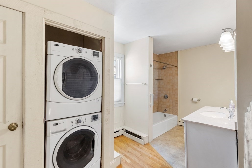 14 Mall Street, Unit B Salem, MA 01970 - Photo 22 of 30 a view of a hallway with washer and dryer