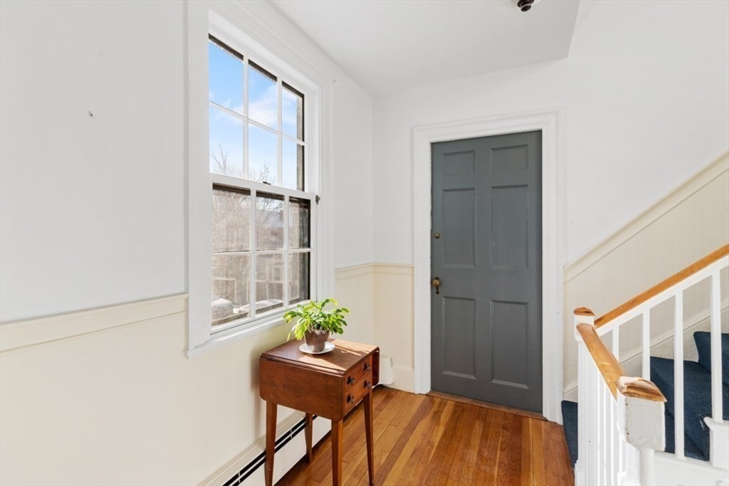 14 Mall Street, Unit B Salem, MA 01970 - Photo 27 of 30 a view of an entryway with wooden floor and a potted plant