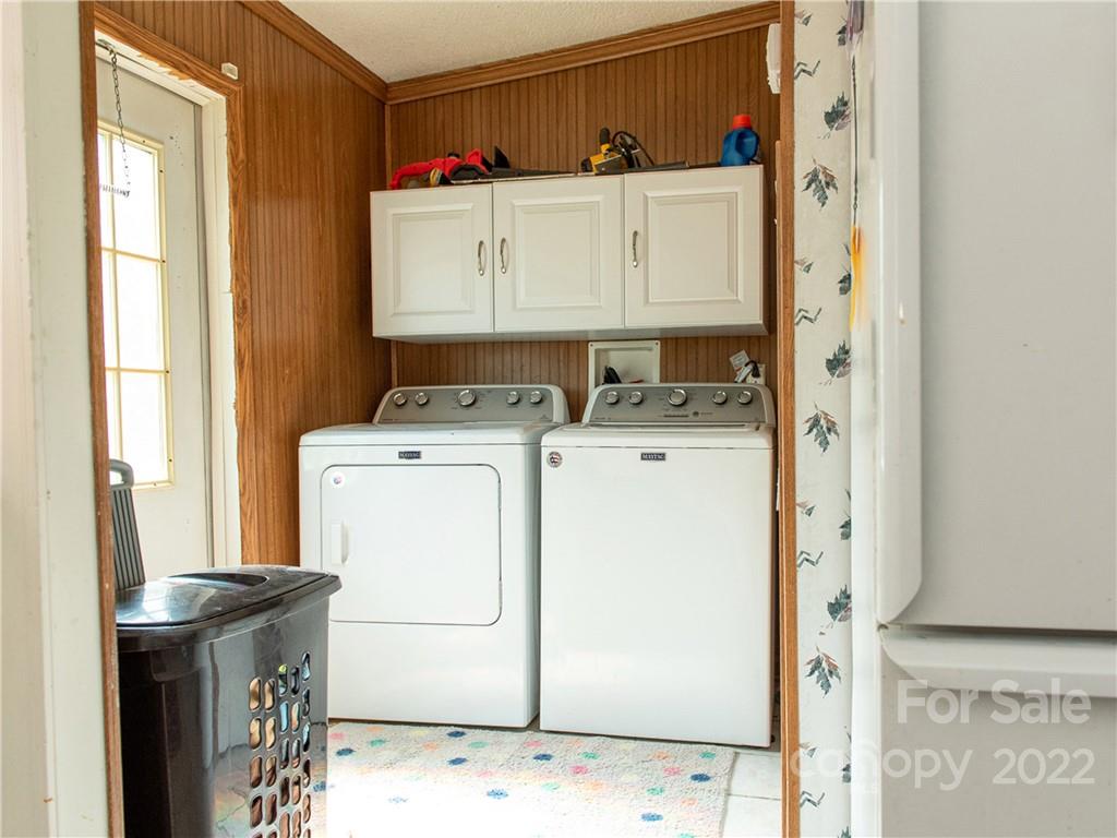 1234 Crabtree Road Waynesville, NC 28785 - Photo 8 of 25 a utility room with dryer and washer