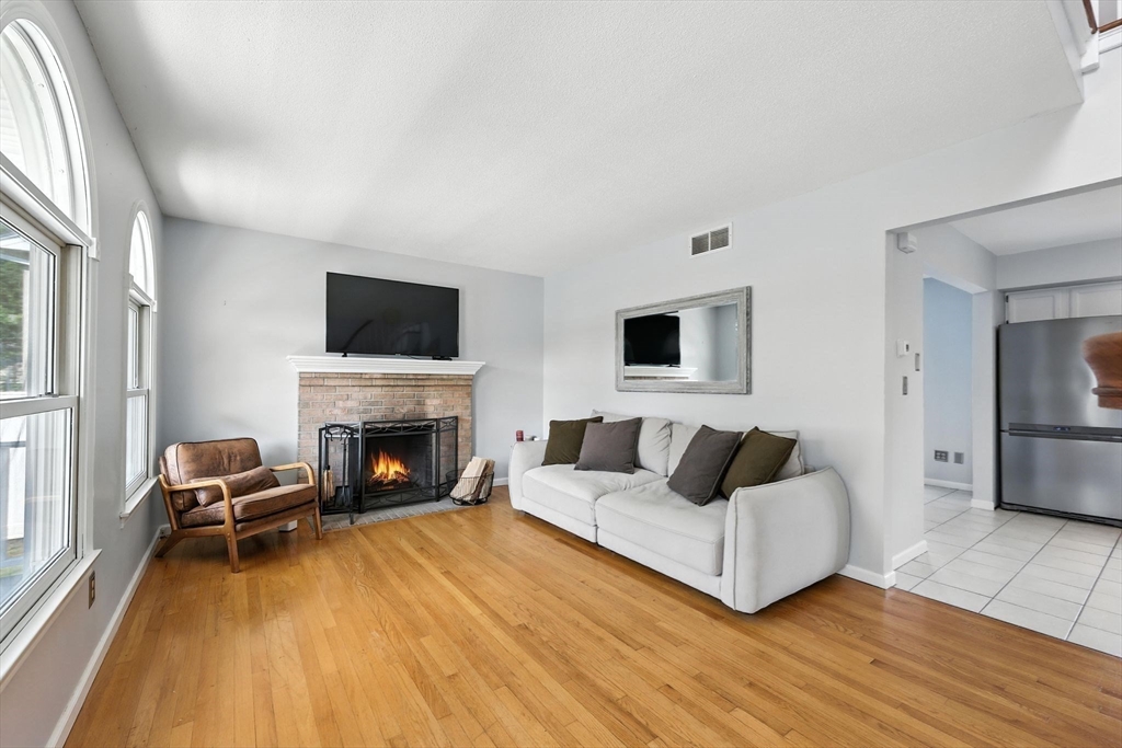 79 Stephanie Circle Springfield, MA 01129 - Photo 3 of 29 a living room with furniture and a fireplace