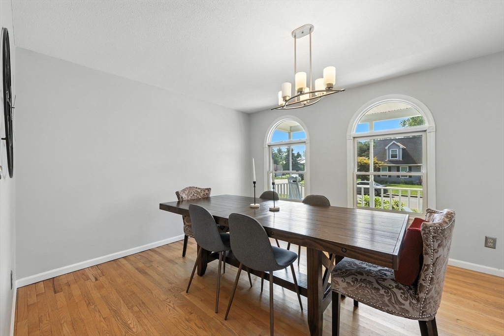 79 Stephanie Circle Springfield, MA 01129 - Photo 8 of 29 a view of a dining room with furniture window and wooden floor