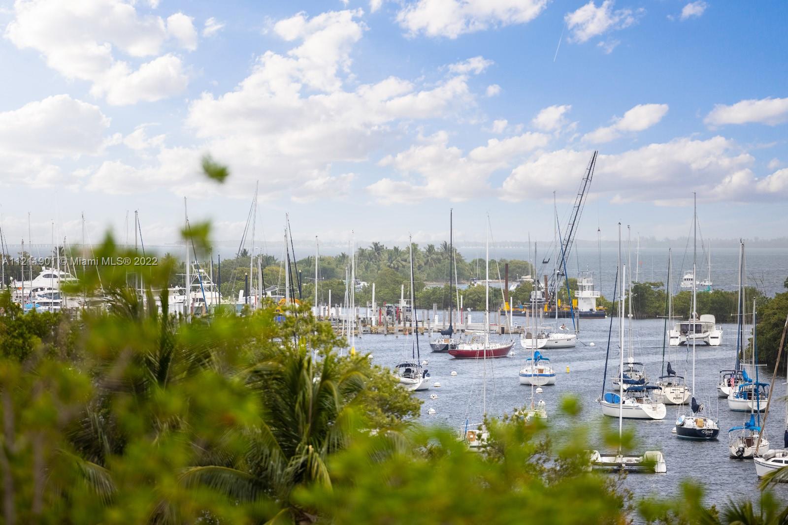 3471 Main Highway, Unit 928 Miami, FL 33133 - Photo 24 of 35 a view of lake with yard