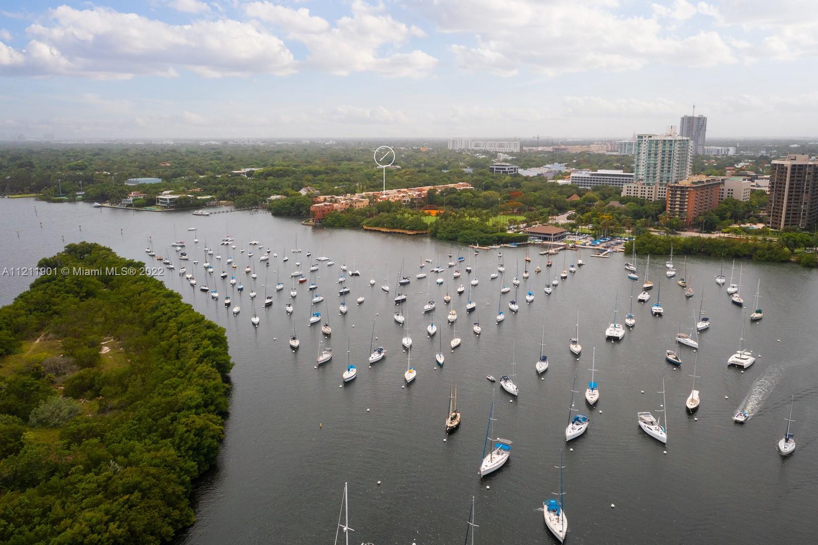 3471 Main Highway, Unit 928 Miami, FL 33133 - Photo 25 of 35 a view of a lake