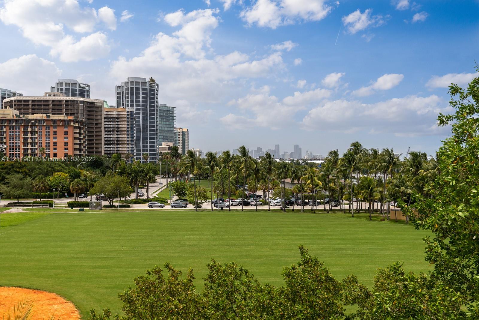 3471 Main Highway, Unit 928 Miami, FL 33133 - Photo 31 of 35 a view of a city with tall buildings in the background