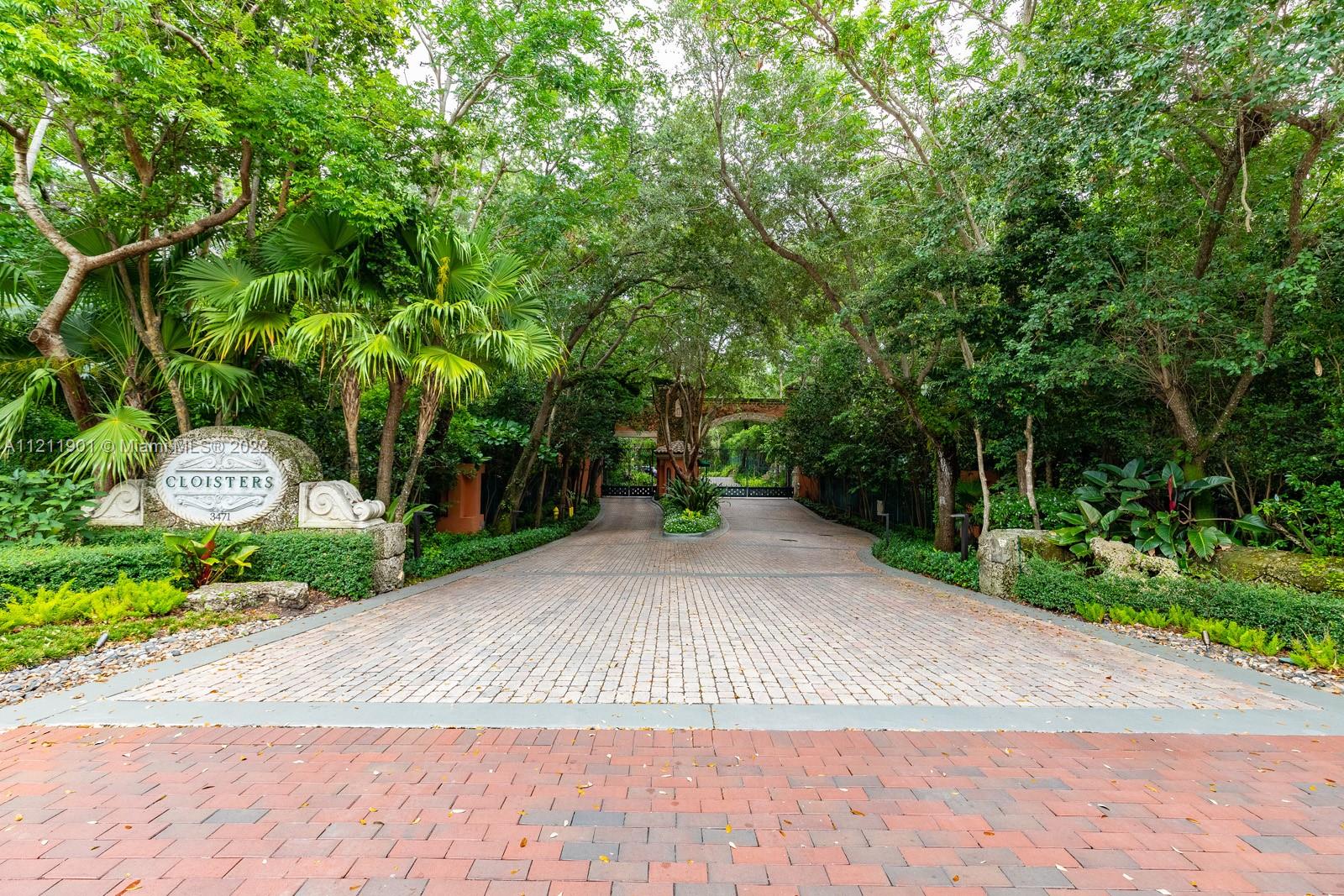 3471 Main Highway, Unit 928 Miami, FL 33133 - Photo 35 of 35 a view of a street with potted plants and trees